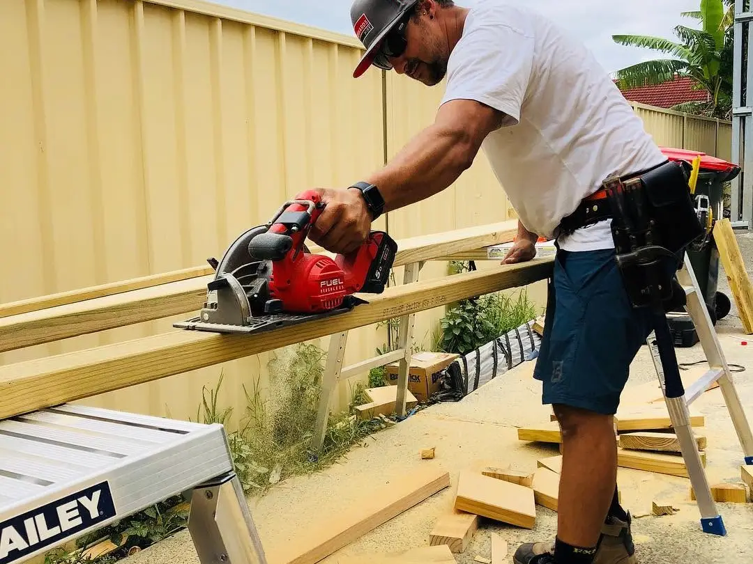 Steve on the tools — he quotes the job and he builds it